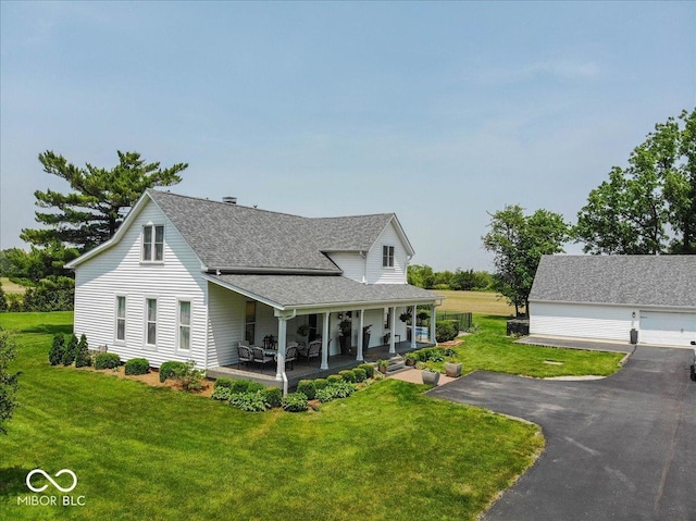 7728 W 200 S, New Palestine, IN 46163 - farmhouse with a shingled roof, a porch, a front yard, and driveway