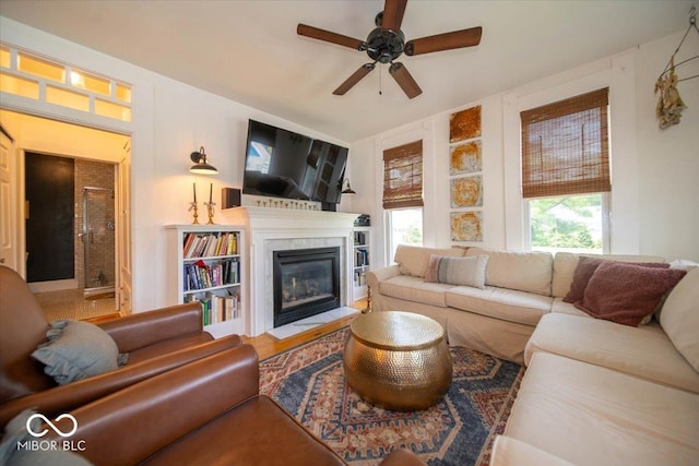 7728 W 200 S, New Palestine, IN 46163 - living room with ceiling fan and a glass covered fireplace