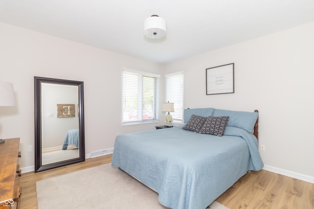 8429 Catamaran Dr, Indianapolis, IN 46236 - bedroom with light wood finished floors and baseboards