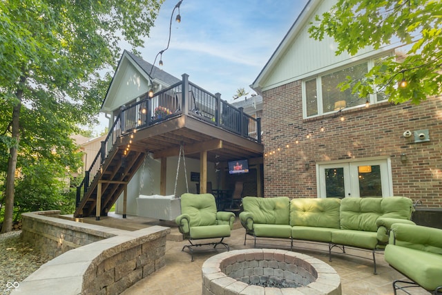 8429 Catamaran Dr, Indianapolis, IN 46236 - rear view of house featuring an outdoor living space with a fire pit, a wooden deck, brick siding, stairway, and a patio area