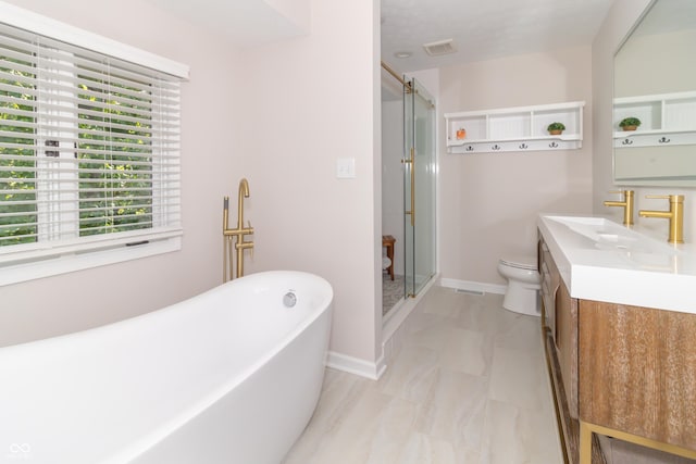 8429 Catamaran Dr, Indianapolis, IN 46236 - bathroom with marble look tile flooring, vanity, a stall shower, and a freestanding tub