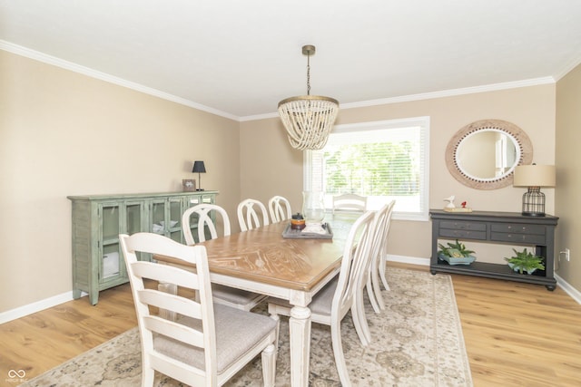 8429 Catamaran Dr, Indianapolis, IN 46236 - dining space with a chandelier, crown molding, and light wood-type flooring