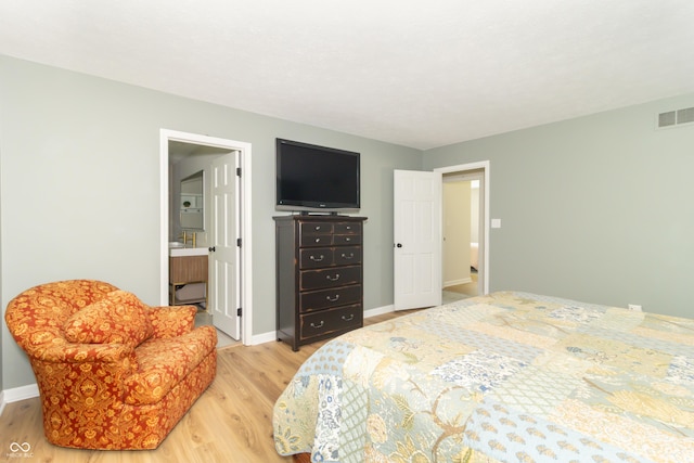 8429 Catamaran Dr, Indianapolis, IN 46236 - bedroom featuring light wood-type flooring and ensuite bathroom
