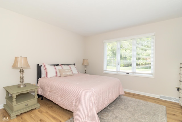 8429 Catamaran Dr, Indianapolis, IN 46236 - bedroom with light wood finished floors and baseboards