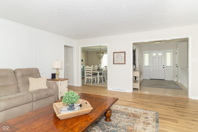 8429 Catamaran Dr, Indianapolis, IN 46236 - living room featuring light wood-style floors