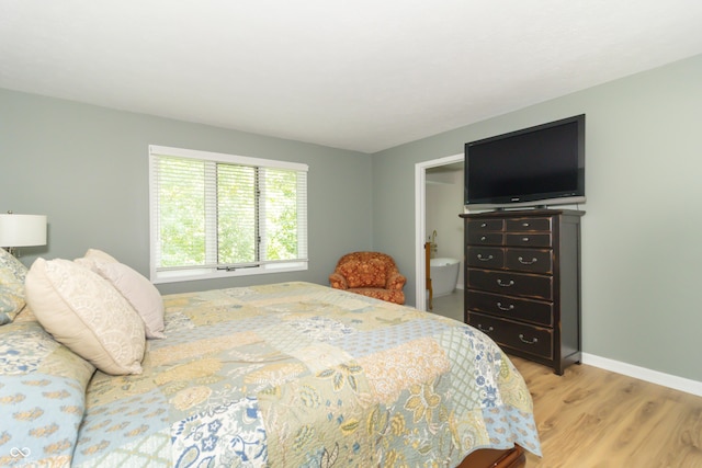 8429 Catamaran Dr, Indianapolis, IN 46236 - bedroom featuring light wood-style flooring and baseboards