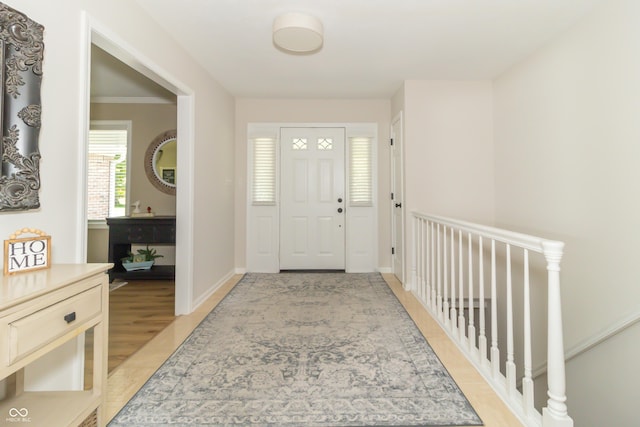 8429 Catamaran Dr, Indianapolis, IN 46236 - foyer entrance featuring light wood-style flooring and baseboards