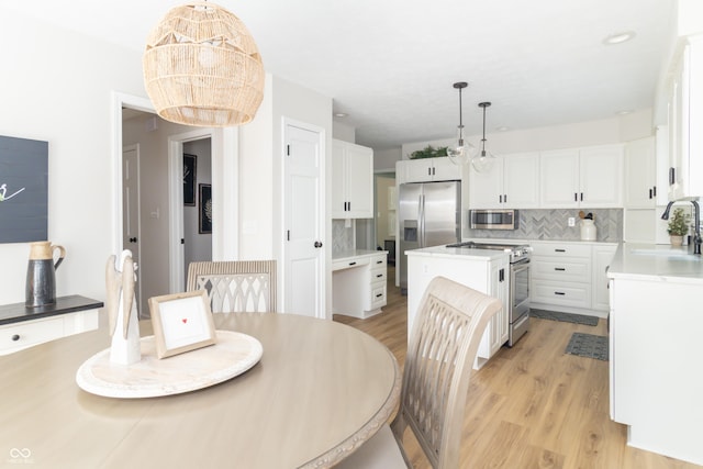 8429 Catamaran Dr, Indianapolis, IN 46236 - dining space with light wood finished floors