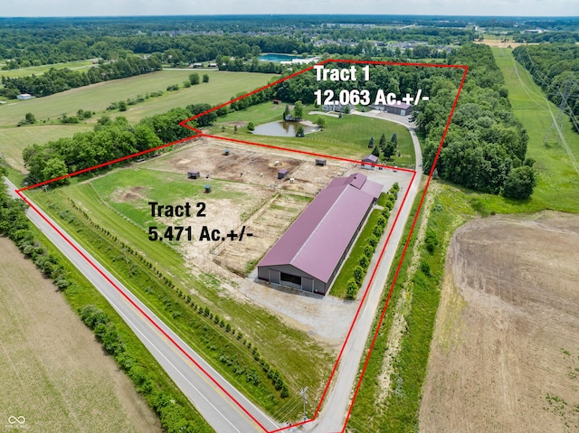3330 Hursh Rd, Fort Wayne, IN 46845 - aerial view of sparsely populated area featuring property parcel outlined and a large body of water