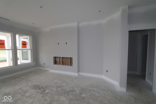 12524 Morning Ridge Way, Noblesville, IN 46060 - unfurnished living room with concrete floors and a fireplace