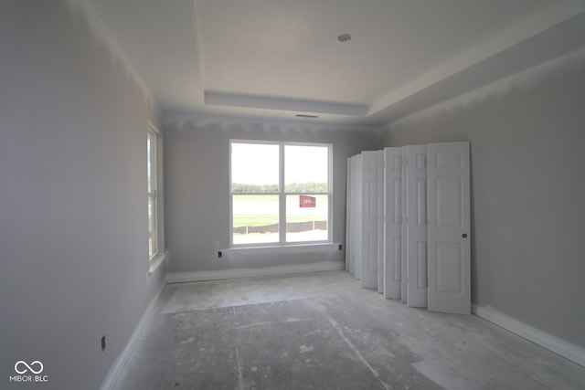 12524 Morning Ridge Way, Noblesville, IN 46060 - unfurnished bedroom featuring a raised ceiling and baseboards