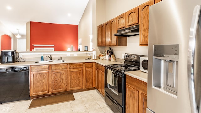 8116 Harshaw Dr, Indianapolis, IN 46239 - kitchen featuring black appliances, under cabinet range hood, light countertops, and brown cabinetry