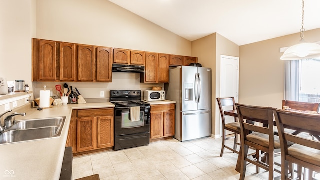 8116 Harshaw Dr, Indianapolis, IN 46239 - kitchen with black / electric stove, stainless steel fridge, range hood, white microwave, and brown cabinetry