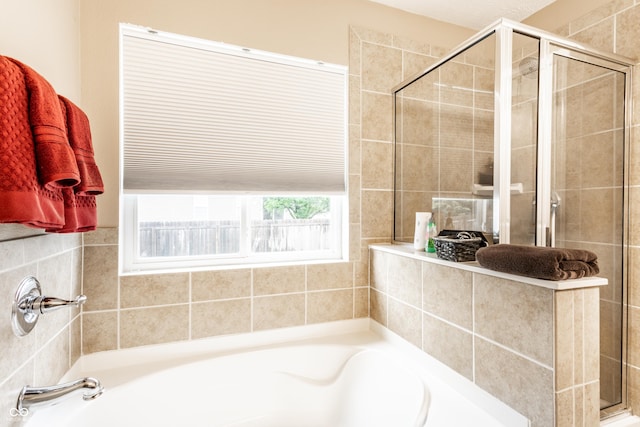 8116 Harshaw Dr, Indianapolis, IN 46239 - bathroom featuring a bath and a stall shower