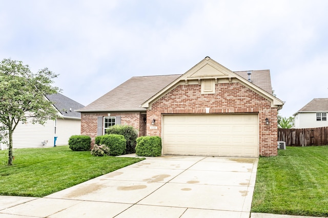 8116 Harshaw Dr, Indianapolis, IN 46239 - view of front facade with brick siding, driveway, a garage, and roof with shingles