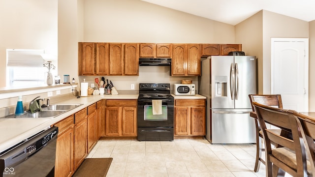 8116 Harshaw Dr, Indianapolis, IN 46239 - kitchen featuring black appliances, extractor fan, high vaulted ceiling, brown cabinetry, and light countertops