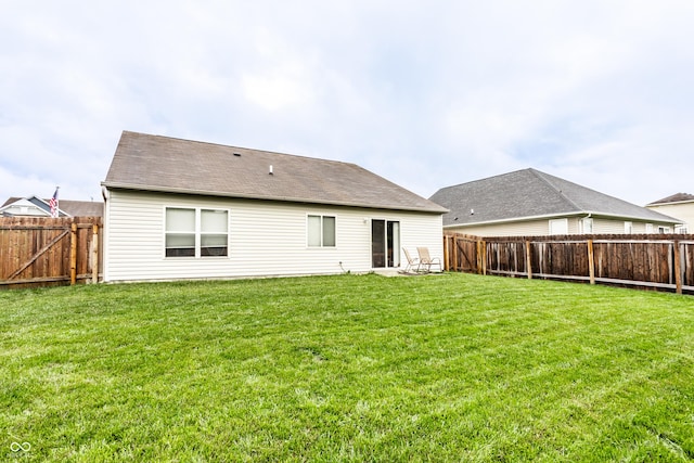 8116 Harshaw Dr, Indianapolis, IN 46239 - rear view of house featuring a fenced backyard