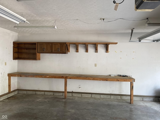 737 Howard St, Shelbyville, IN 46176 - garage featuring a garage door opener and baseboards