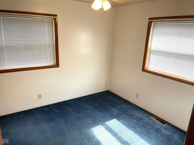 737 Howard St, Shelbyville, IN 46176 - empty room featuring carpet floors and ceiling fan