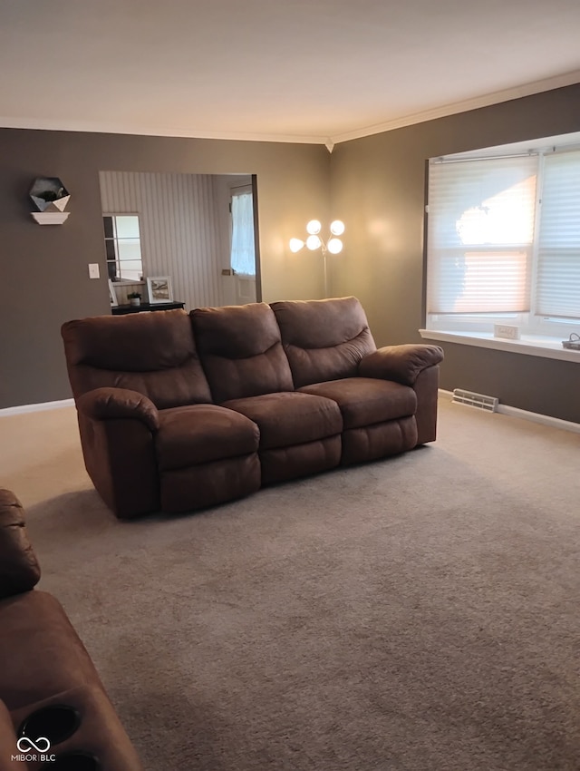 721 Maplewood Ave, Anderson, IN 46012 - carpeted living room with ornamental molding and baseboards