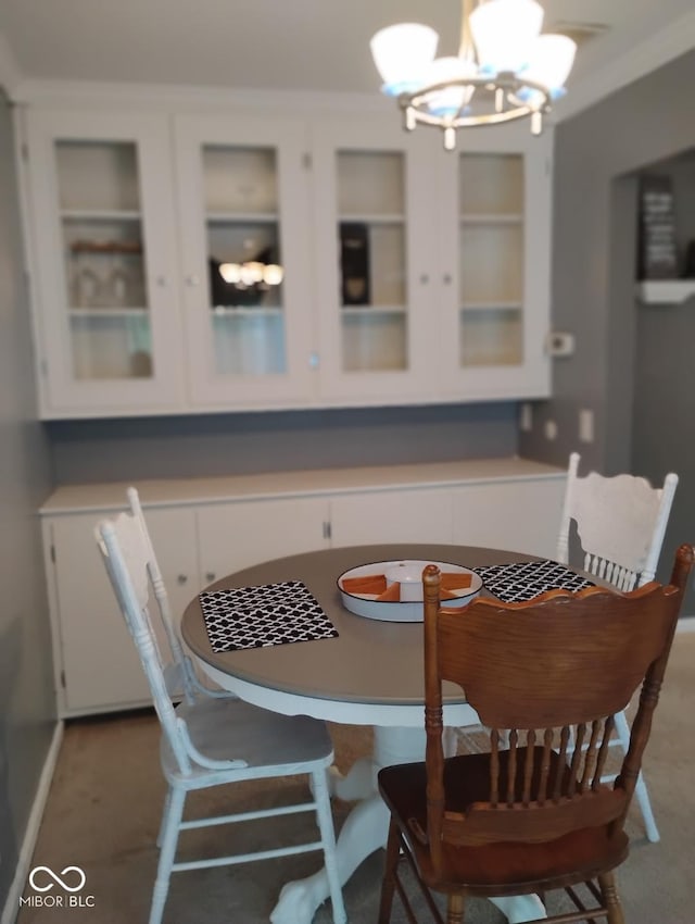 721 Maplewood Ave, Anderson, IN 46012 - dining room with a chandelier and built in shelves
