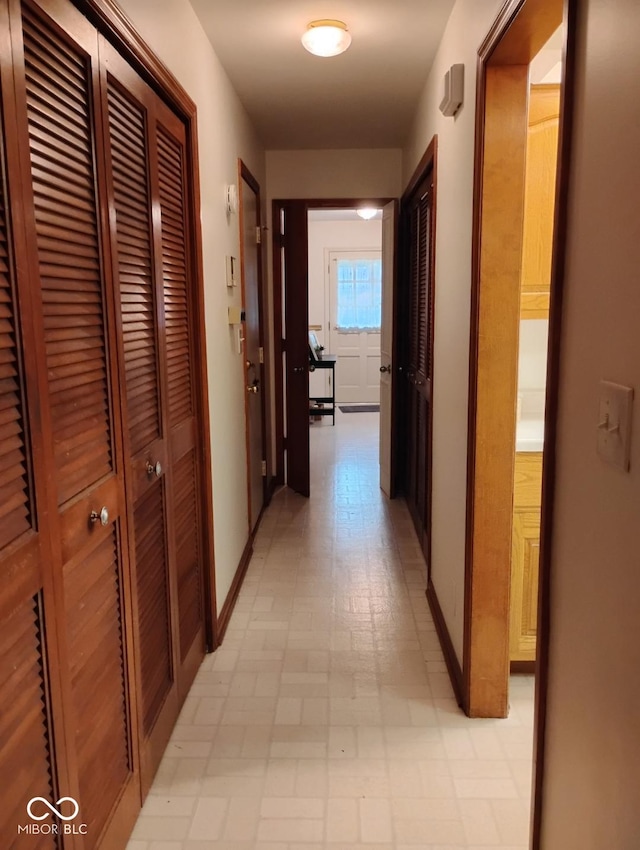 721 Maplewood Ave, Anderson, IN 46012 - hallway with baseboards and light floors