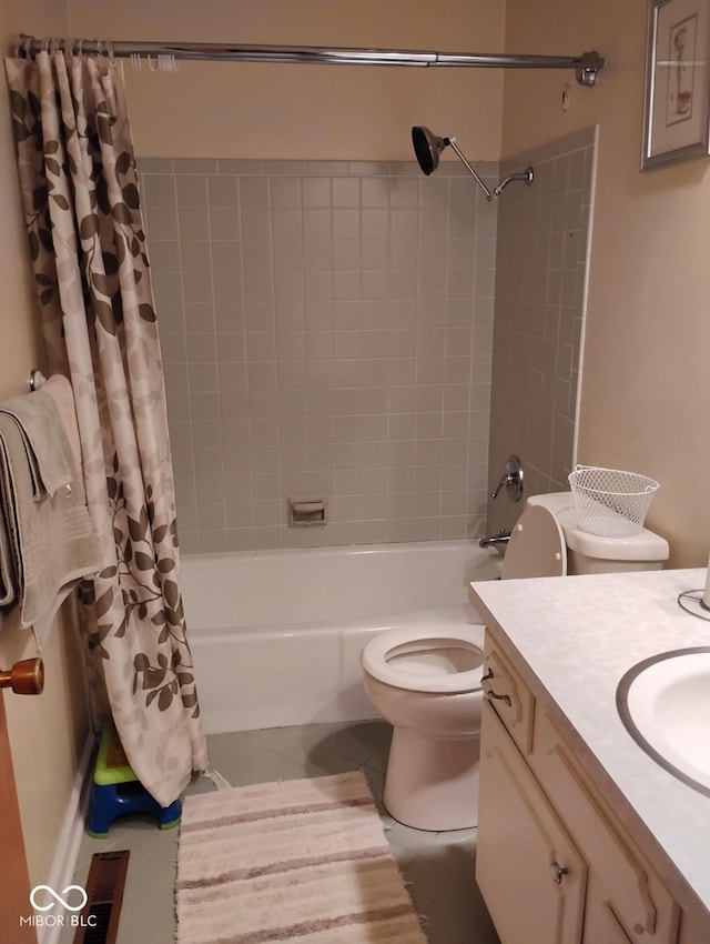 721 Maplewood Ave, Anderson, IN 46012 - bathroom featuring shower / tub combo with curtain, vanity, and tile patterned floors