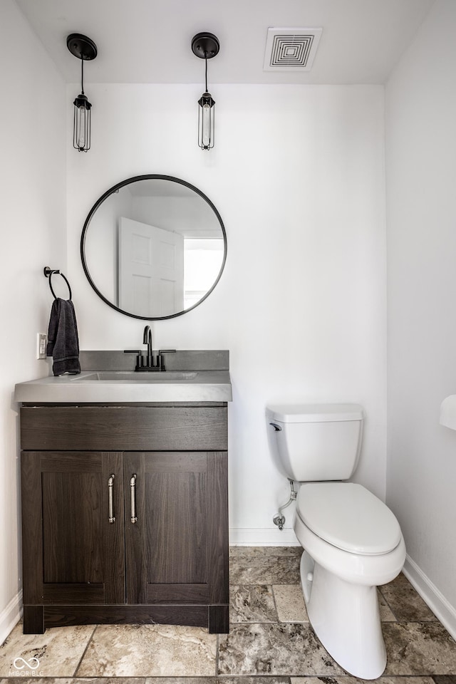 6164 Afton Crst, Indianapolis, IN 46220 - bathroom featuring vanity and stone finish floors