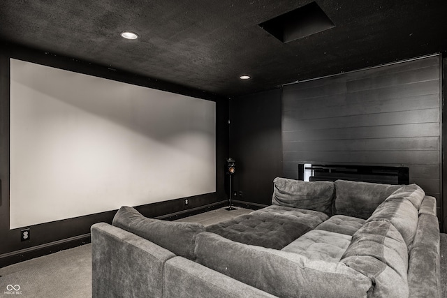 6164 Afton Crst, Indianapolis, IN 46220 - carpeted home theater room featuring recessed lighting and a fireplace