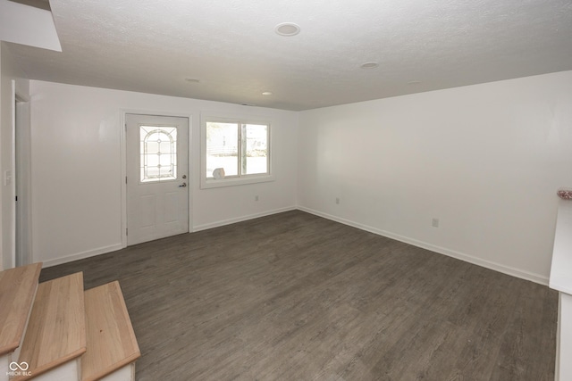 12003 Broadway St, Indianapolis, IN 46236 - foyer entrance featuring baseboards and dark wood-type flooring