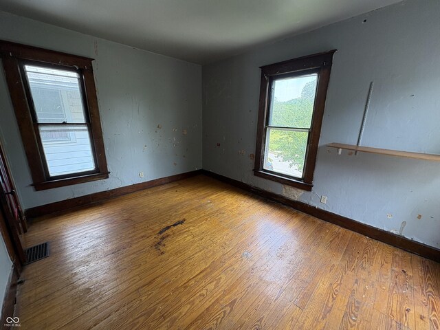 807 N Elm St, Muncie, IN 47305 - spare room with hardwood / wood-style floors and baseboards