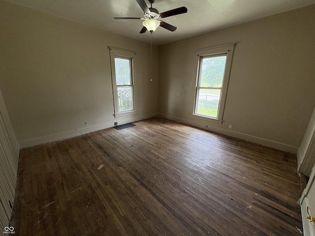 807 N Elm St, Muncie, IN 47305 - unfurnished room featuring dark wood finished floors and ceiling fan