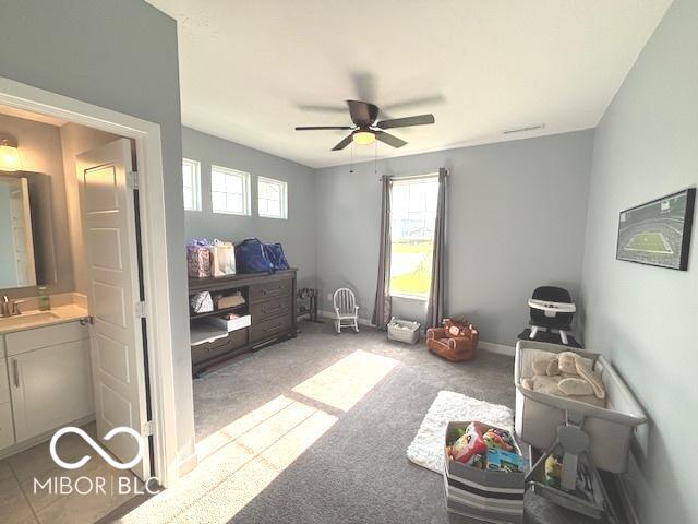 520 Ferndale Ln, Danville, IN 46122 - playroom featuring a ceiling fan and carpet floors