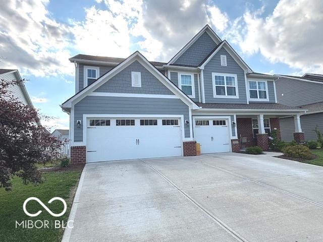 520 Ferndale Ln, Danville, IN 46122 - craftsman-style home featuring driveway and brick siding