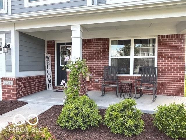 520 Ferndale Ln, Danville, IN 46122 - entrance to property featuring a porch and brick siding