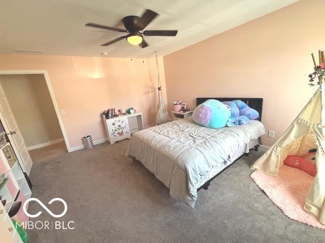 520 Ferndale Ln, Danville, IN 46122 - bedroom with carpet floors and ceiling fan