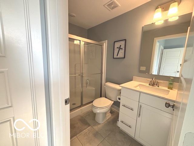520 Ferndale Ln, Danville, IN 46122 - bathroom with vanity, tile patterned flooring, and a shower stall