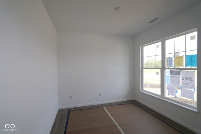 12532 Morning Ridge Way, Noblesville, IN 46060 - spare room featuring baseboards and wood finished floors
