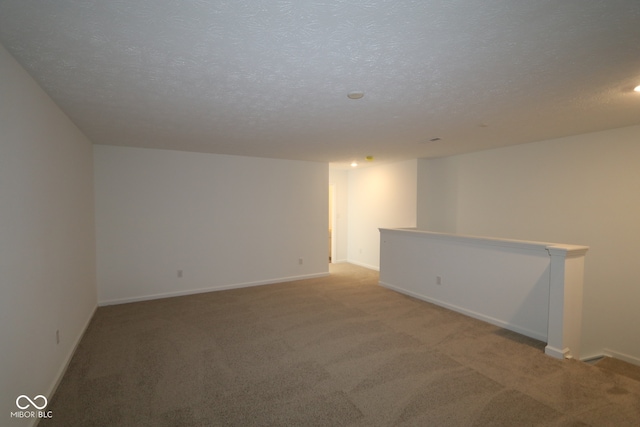 12532 Morning Ridge Way, Noblesville, IN 46060 - carpeted empty room with a textured ceiling