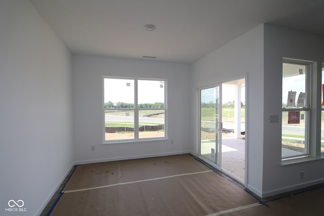 12532 Morning Ridge Way, Noblesville, IN 46060 - empty room with baseboards and wood finished floors