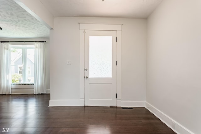 525 Orange St, Indianapolis, IN 46203 - foyer entrance featuring dark wood-type flooring