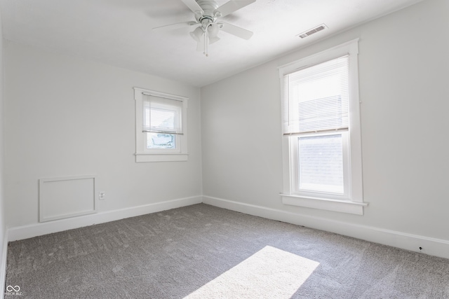 525 Orange St, Indianapolis, IN 46203 - carpeted empty room with ceiling fan and baseboards