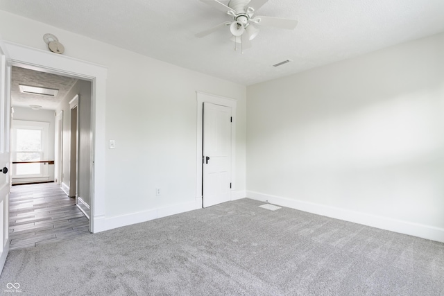 525 Orange St, Indianapolis, IN 46203 - spare room with carpet floors and a ceiling fan