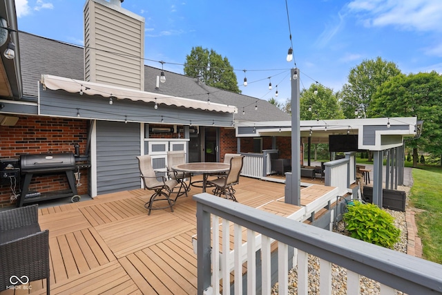 12196 N Beth Ann Dr, Camby, IN 46113 - wooden deck with outdoor dining space and grilling area