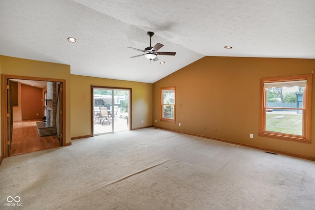 12196 N Beth Ann Dr, Camby, IN 46113 - unfurnished room with ceiling fan, lofted ceiling, light colored carpet, recessed lighting, and a textured ceiling