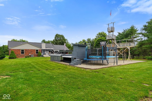 12196 N Beth Ann Dr, Camby, IN 46113 - view of green lawn with a deck