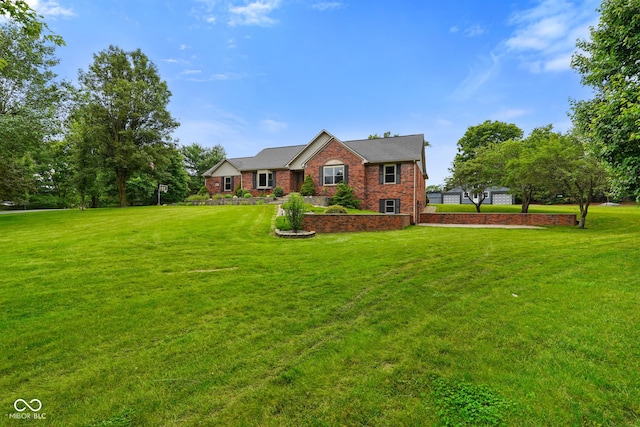 12196 N Beth Ann Dr, Camby, IN 46113 - view of front of home featuring a front lawn and brick siding