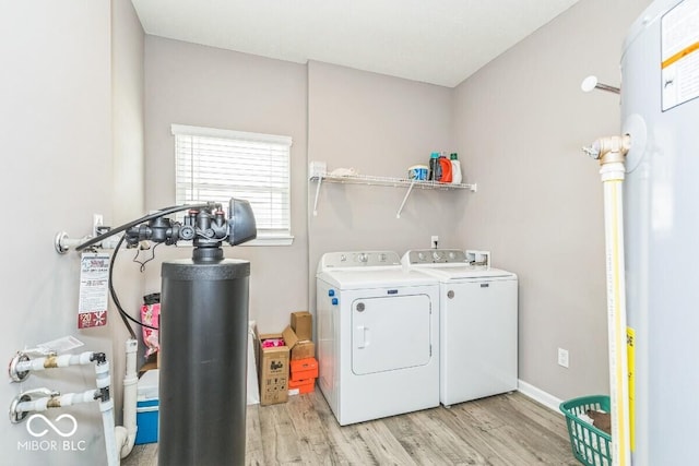 1758 Pelham Dr, Greenwood, IN 46143 - washroom featuring separate washer and dryer and light wood-style floors