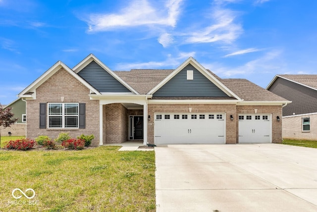 1758 Pelham Dr, Greenwood, IN 46143 - view of front of house with a garage, brick siding, driveway, and a front yard