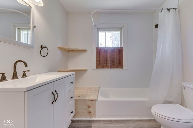 2245 N Ritter Ave, Indianapolis, IN 46218 - bathroom with vanity, wood finished floors, and shower / tub combo